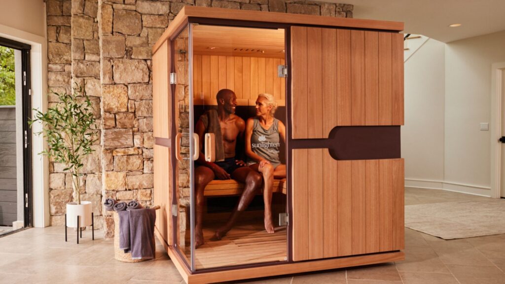 Two People Smiling In Sunlighten Infrared Sauna
